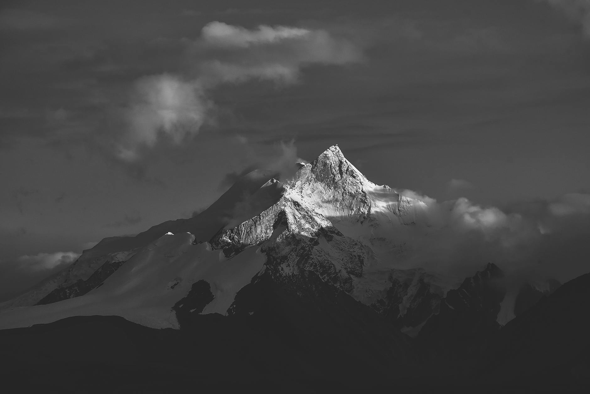 grayscale photo of snow covered mountain
