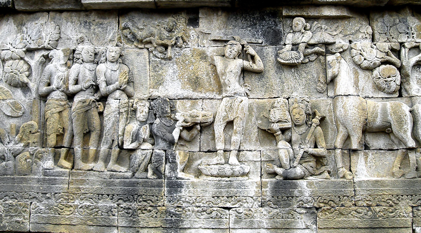 Image of ancient bas relief of puja